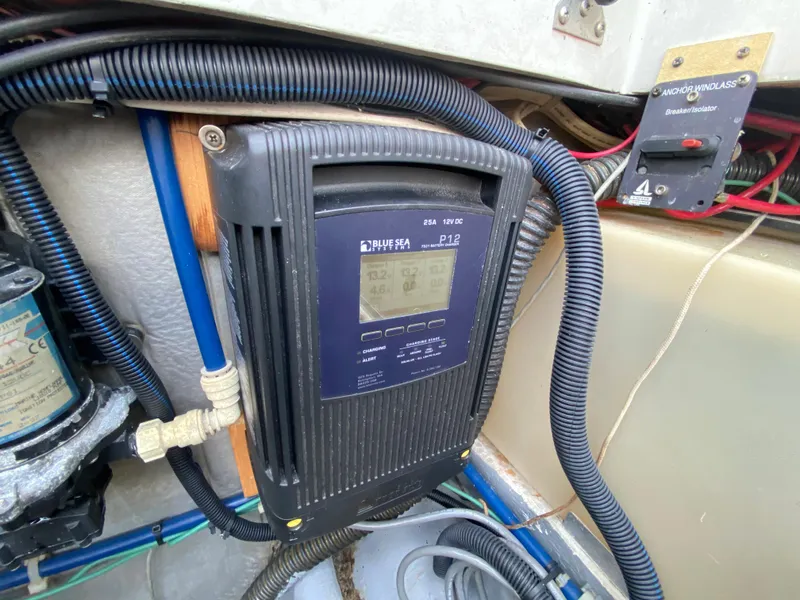 Slide: The Image of Electrical system components in a 1997 Stamas 310 Express boat. - 29