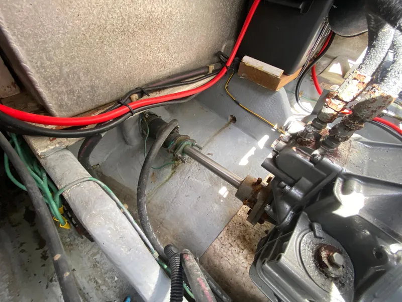 Slide: The Image of 1997 Stamas 310 Express engine compartment with wiring and mechanical components. - 30