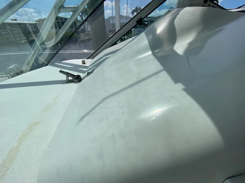 Slide: The Image of 1997 Stamas 310 Express boat deck and windshield in sunlight. - 37