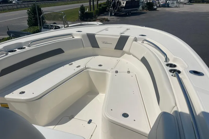 Slide: The Image of 2026 Pioneer 250 Pelagic boat interior with spacious seating and sleek design. - 5