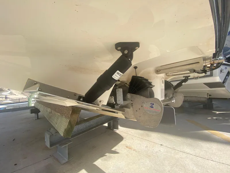 Slide: The Image of Close-up of 2018 Yamaha Boats 242 Limited S hull and propeller. - 13