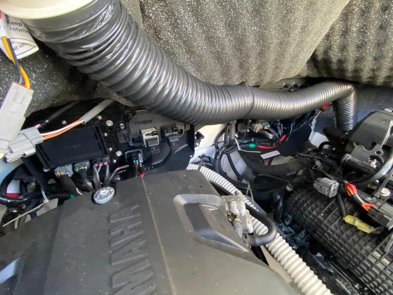 Slide: The Image of Engine compartment of 2018 Yamaha Boats 242 Limited S, showcasing wiring and components. - 17