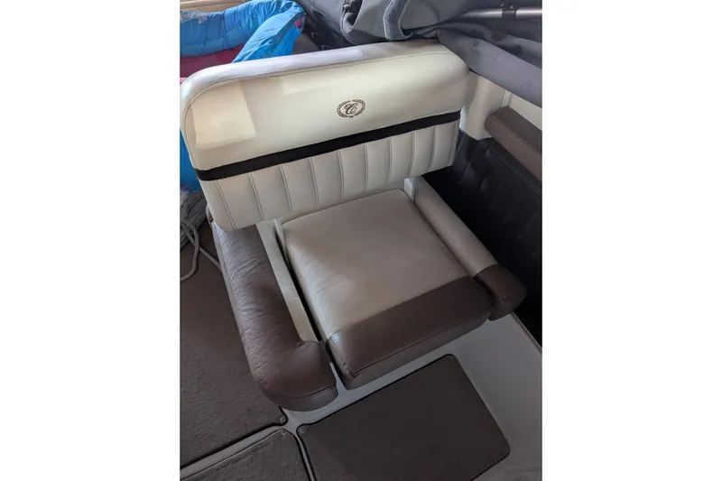 Slide: The Image of 2013 Cobalt 26SD boat seat with beige and brown upholstery. - 9