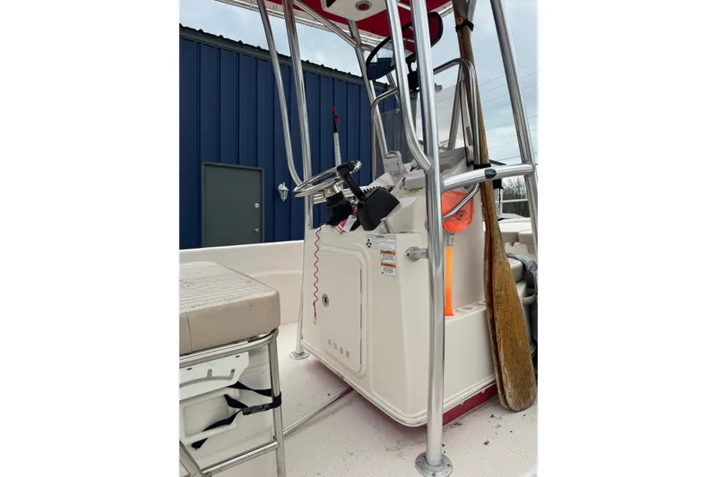 Slide: The Image of 2016 Carolina Skiff 218 DLV boat interior with console and equipment. - 5