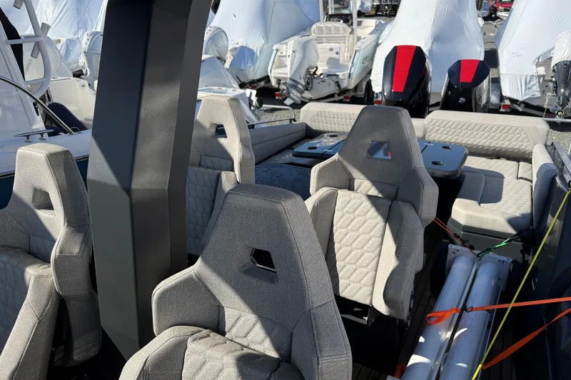 Slide: The Image of 2024 Skipper-BSK 38NC boat interior with modern seating and sleek design. - 15