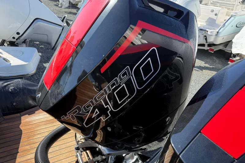 Slide: The Image of Outboard motor with "Racing 400" branding on a Skipper-BSK 38NC, 2024 model. - 17
