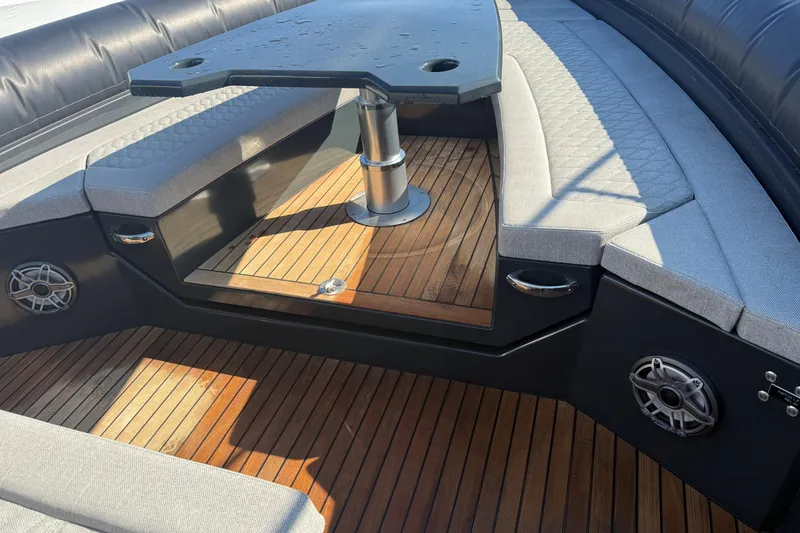 Slide: The Image of Luxurious 2024 Skipper-BSK 38NC boat interior with cushioned seating and wooden flooring. - 4