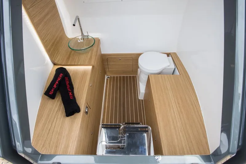Slide: The Image of Manufacturer Provided Image: 2024 Skipper-BSK 38NC boat interior with modern bathroom amenities. - 9