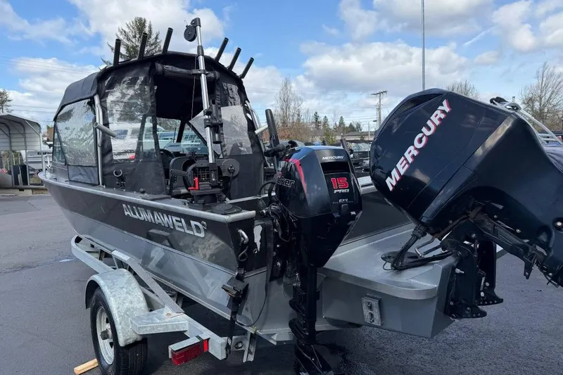 Slide: The Image of 2010 Alumaweld Blackhawk 202 boat with Mercury outboard motors on a trailer. - 4