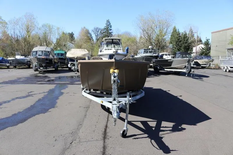 Slide: The Image of 2025 Smoker Craft Pro Sportsman 1866 boat on trailer in parking lot. - 4