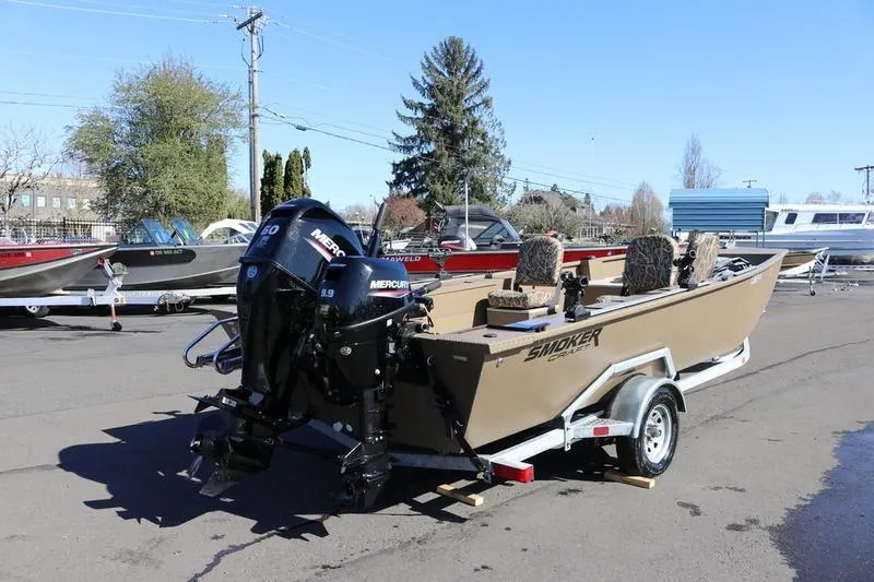Slide: The Image of 2025 Smoker Craft Pro Sportsman 1866 boat on trailer with Mercury outboard engines. - 7