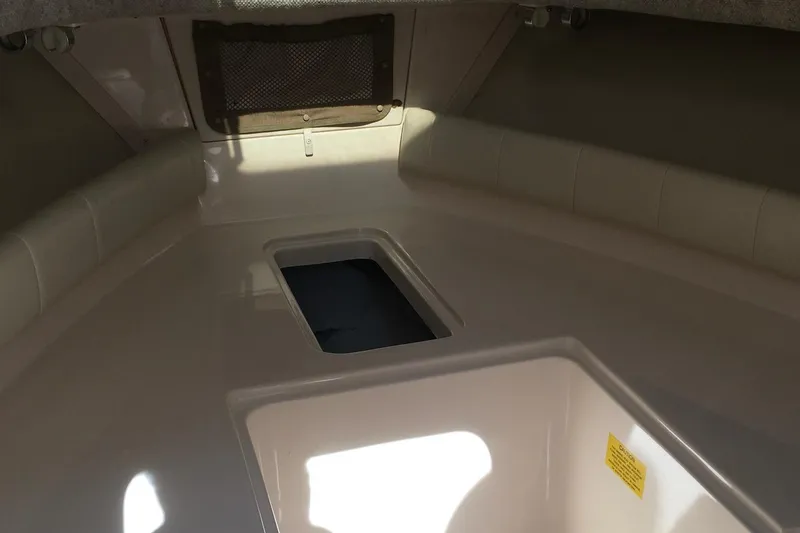 Slide: The Image of 2007 Grady-White Adventure 208 boat interior with storage compartment. - 10