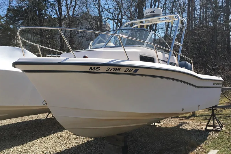 Slide: The Image of 2007 Grady-White Adventure 208 boat on display outdoors. - 3