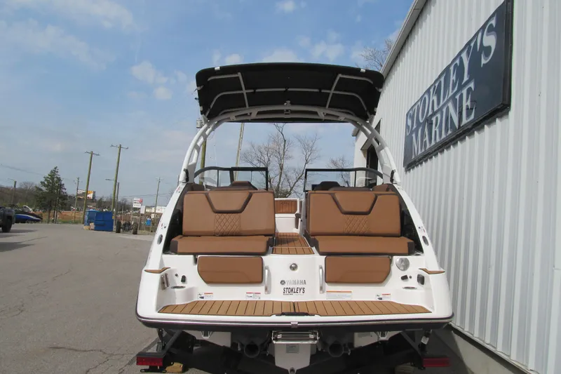 Slide: The Image of 2025 Yamaha Boats 252SD at Stokley's Marine, showcasing rear seating and sleek design. - 4