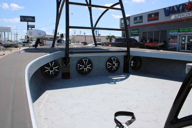 Slide: The Image of 2023 Mamba 24VX boat with Minn Kota Riptide motor at dealership. - 14