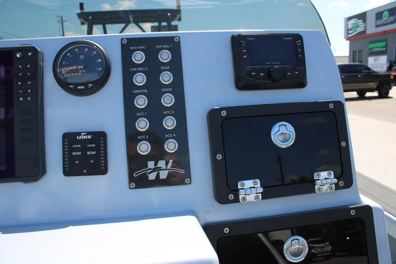 Slide: The Image of 2023 Mamba 24VX boat livewell with open lid, showcasing interior features. - 19