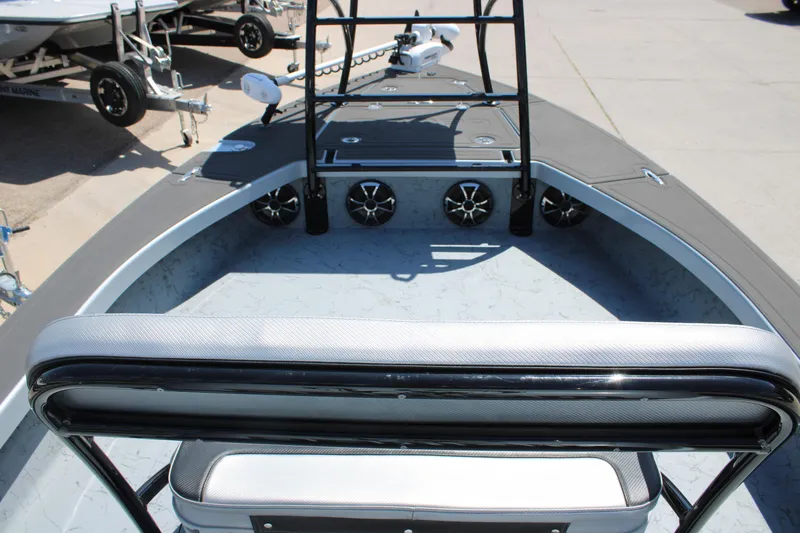 Slide: The Image of 2023 Mamba 24VX boat with elevated platform in a dealership lot. - 20