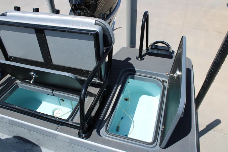 Slide: The Image of Control panel of 2023 Mamba 24VX boat with steering wheel and navigation system. - 4