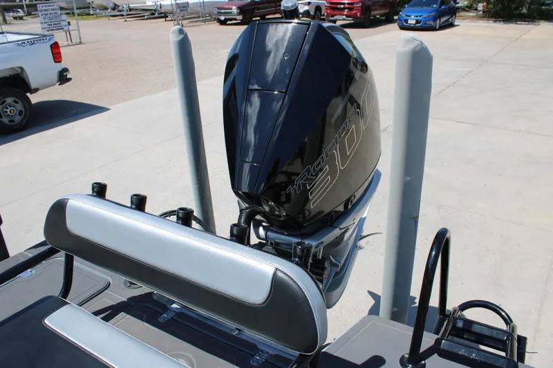 Slide: The Image of 2023 Mamba 24VX boat at Waypoint Marine Supercenter under clear blue sky. - 5