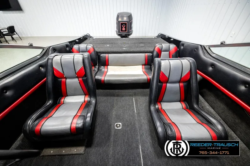 Slide: The Image of Interior of 1992 Stratos 290 Ski-N-Fish boat with red and gray seating. - 15