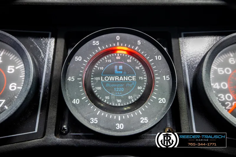 Slide: The Image of Close-up of Lowrance Bluewater Pro 1220 gauge on 1992 Stratos 290 Ski-N-Fish boat. - 29