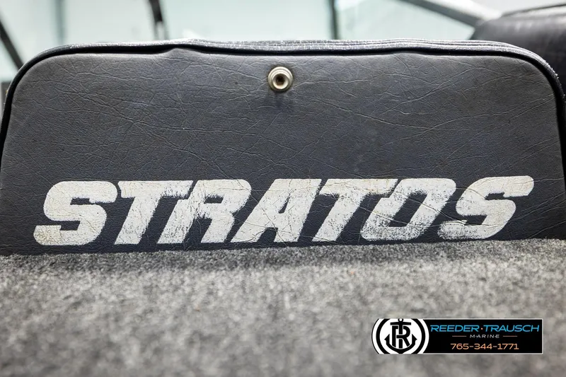 Slide: The Image of 1992 Stratos 290 Ski-N-Fish boat interior with logo and textured upholstery. - 35