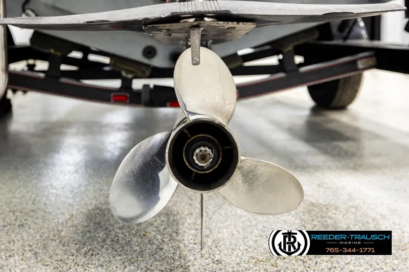 Slide: The Image of Propeller of a 1992 Stratos 290 Ski-N-Fish boat on a trailer. - 40