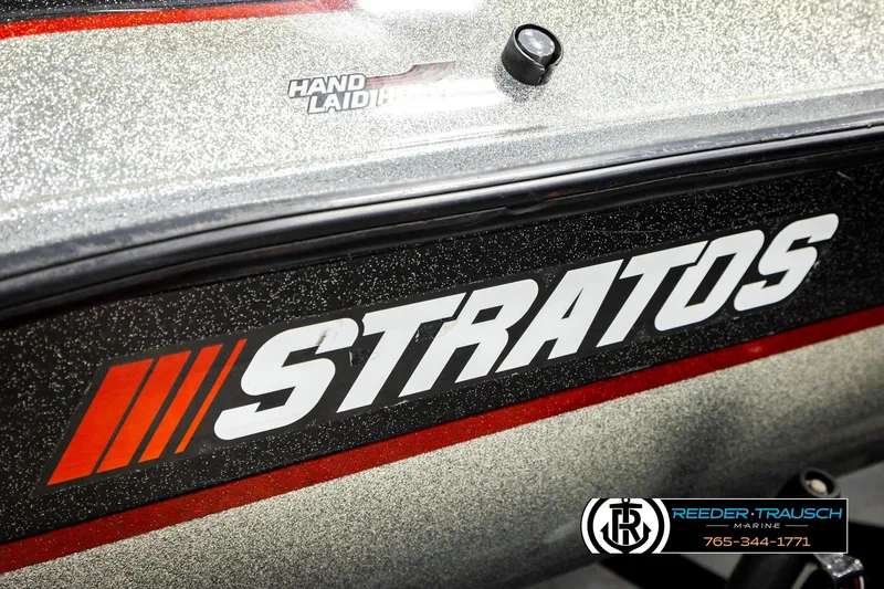 Slide: The Image of 1992 Stratos 290 Ski-N-Fish boat with hand-laid construction, featuring bold branding. - 42