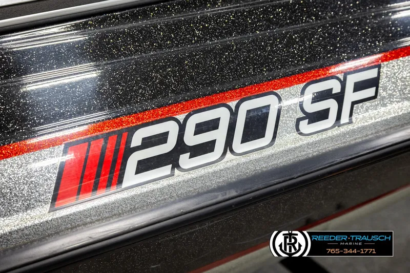 Slide: The Image of 1992 Stratos 290 Ski-N-Fish boat with glittery finish and bold "290 SF" decal. - 43