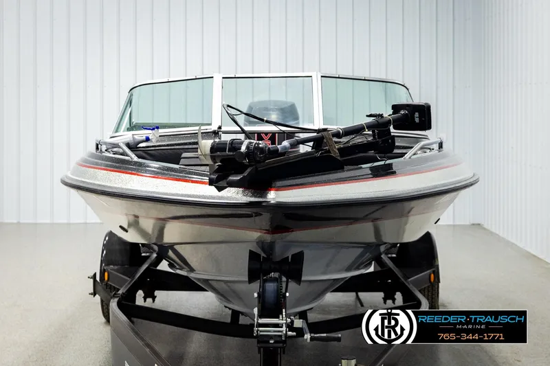 Slide: The Image of 1992 Stratos 290 Ski-N-Fish boat on trailer, front view in showroom. - 6