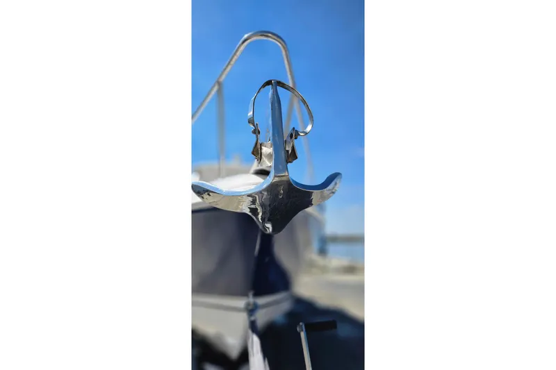 Slide: The Image of Close-up of a 2004 Donzi 38 ZSF boat anchor against a clear blue sky. - 22