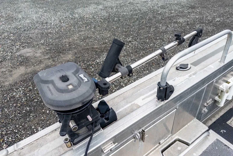 Slide: The Image of Fishing rod holder on a 2003 Lifetimer 3050 Pleasure Cabin boat deck. - 13
