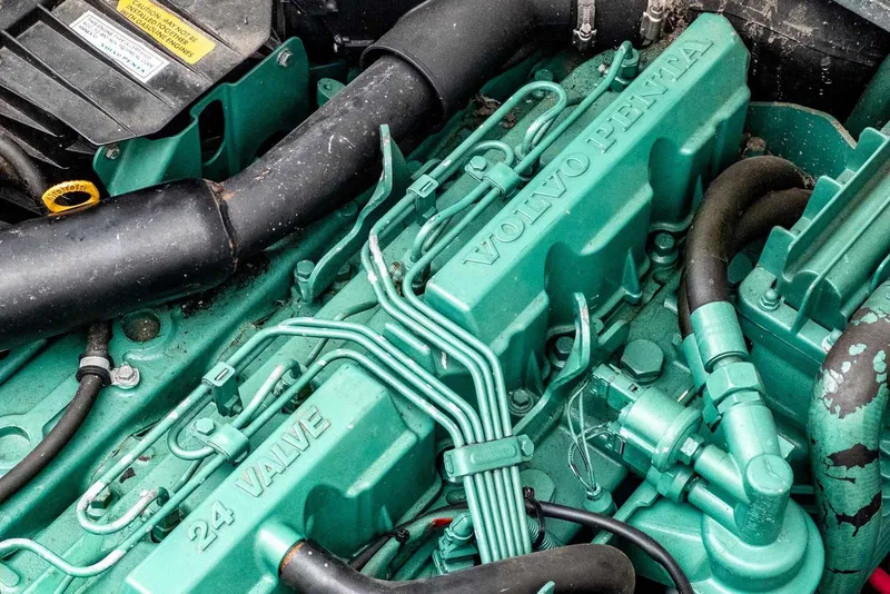 Slide: The Image of Engine of a 2003 Lifetimer 3050 Pleasure Cabin boat, featuring Volvo Penta components. - 15