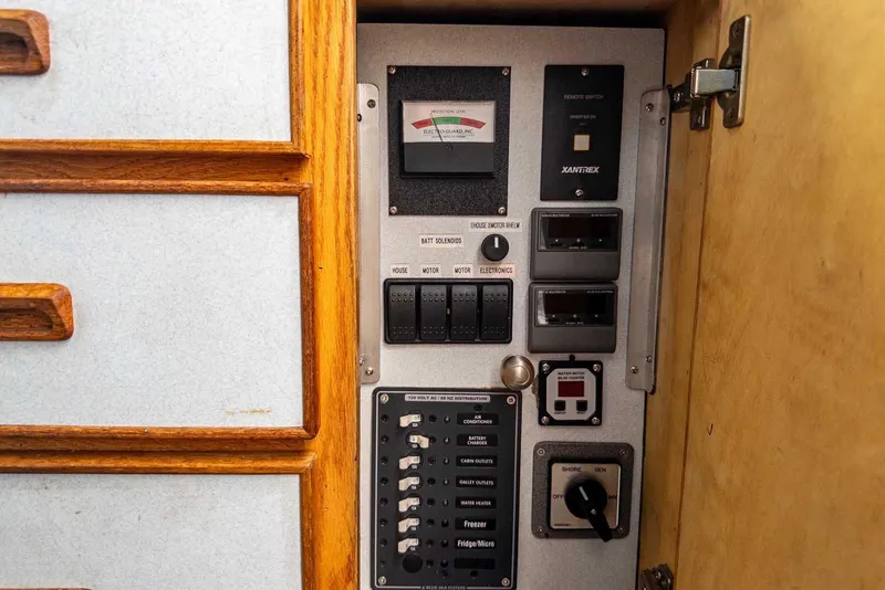 Slide: The Image of Electrical control panel inside 2003 Lifetimer 3050 Pleasure Cabin boat. - 26