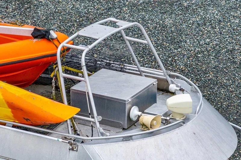 Slide: The Image of Top view of a 2003 Lifetimer 3050 Pleasure Cabin boat with kayaks. - 7