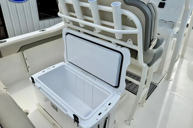 Slide: The Image of Open cooler on 2026 Key West 219 FS boat, showcasing seating and storage features. - 28