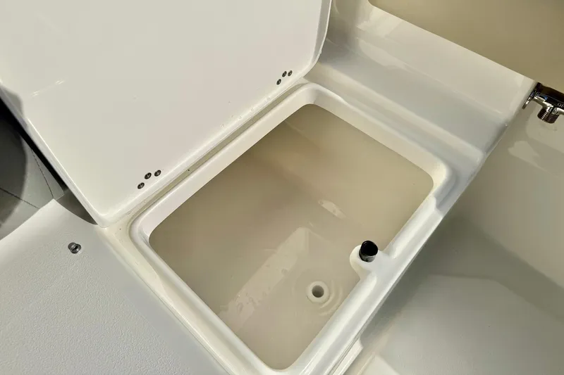 Slide: The Image of Open storage compartment on 2026 Key West 219 FS boat. - 31