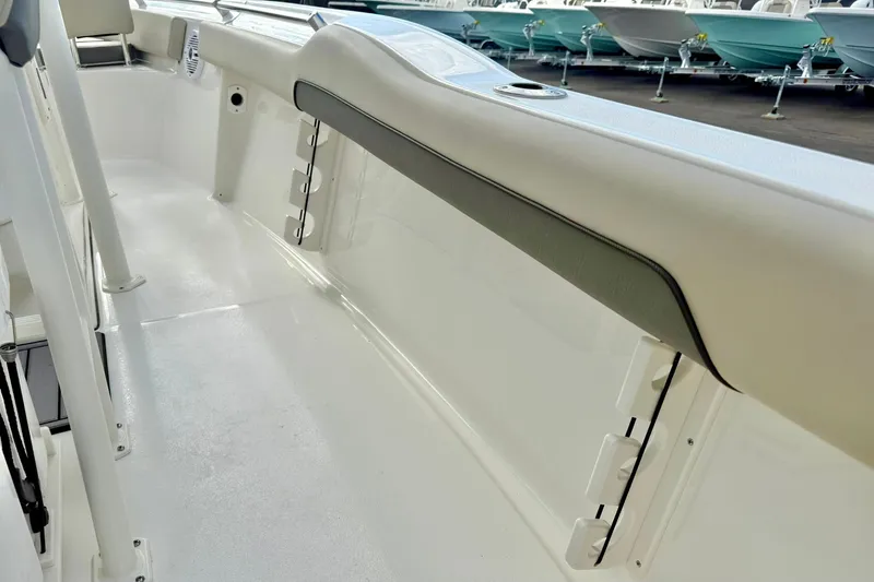 Slide: The Image of Interior view of 2026 Key West 219 FS boat, showcasing sleek white design and seating. - 34