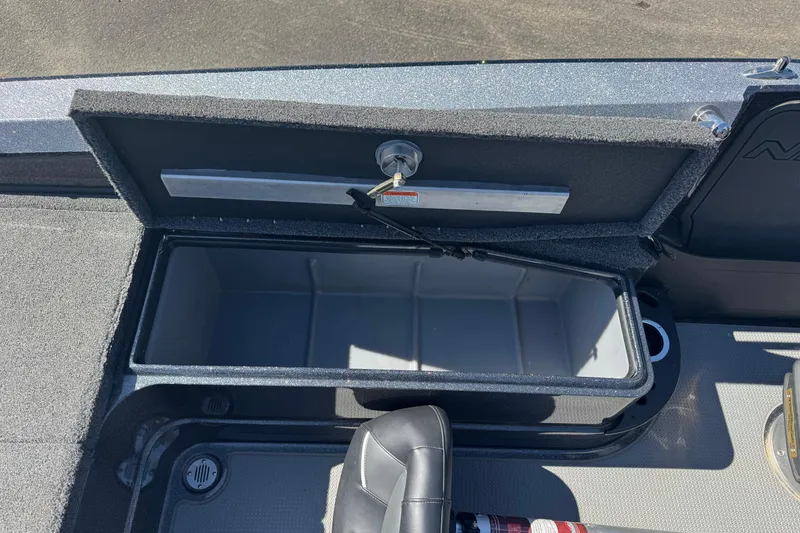 Slide: The Image of Open storage compartment in 2023 Nitro ZV20 boat, showcasing spacious interior. - 10