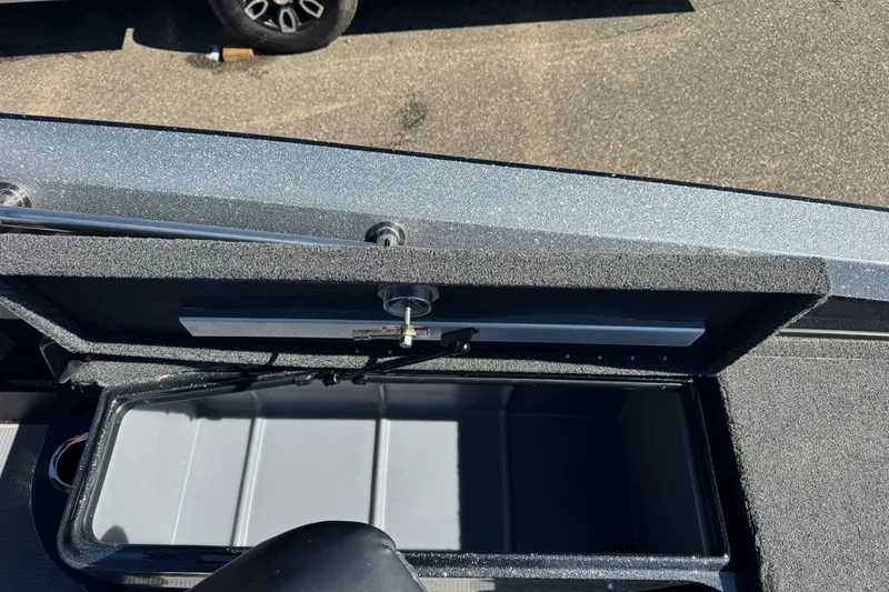 Slide: The Image of Open storage compartment on 2023 Nitro ZV20 boat, showcasing interior details. - 12