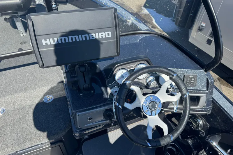 Slide: The Image of Dashboard of a 2023 Nitro ZV20 boat with Humminbird display and steering wheel. - 6