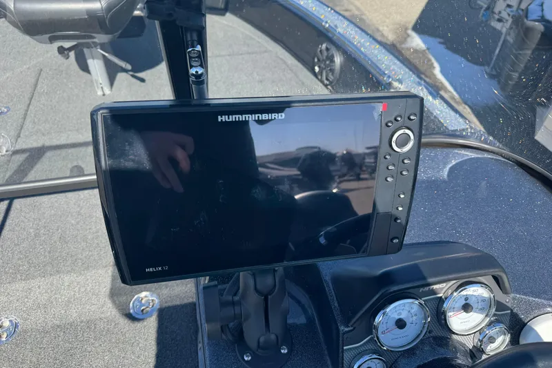 Slide: The Image of 2023 Nitro ZV20 boat dashboard with Humminbird Helix 12 fish finder and gauges. - 7