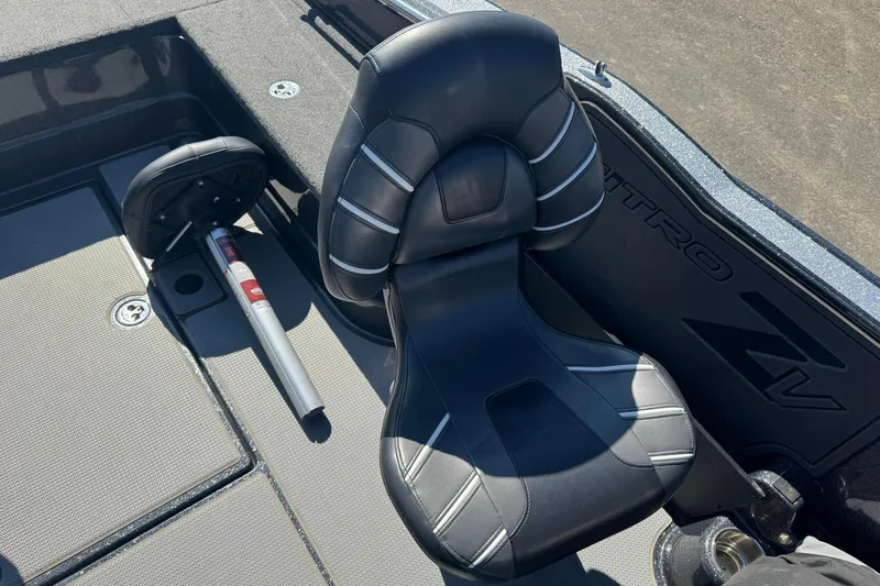 Slide: The Image of 2023 Nitro ZV20 boat seat with sleek black design and modern stitching. - 8
