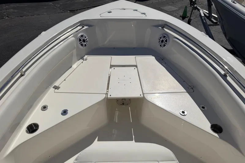 Slide: The Image of 2026 Key West 203 FS boat interior with seating and storage compartments. - 24