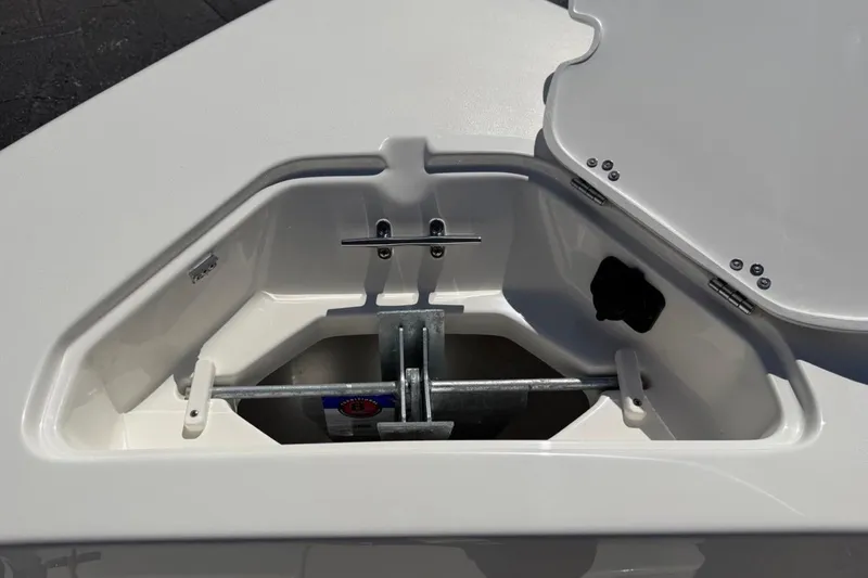 Slide: The Image of Anchor storage compartment of 2026 Key West 203 FS boat, open lid view. - 26