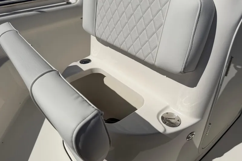 Slide: The Image of 2026 Key West 203 FS boat seat with diamond-stitched upholstery and storage compartment. - 28