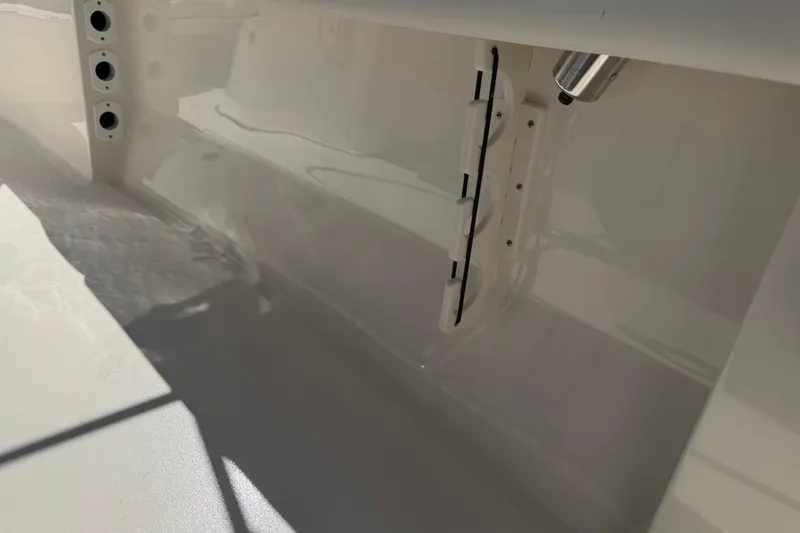Slide: The Image of Interior view of a 2026 Key West 203 FS boat, showcasing sleek design details. - 32