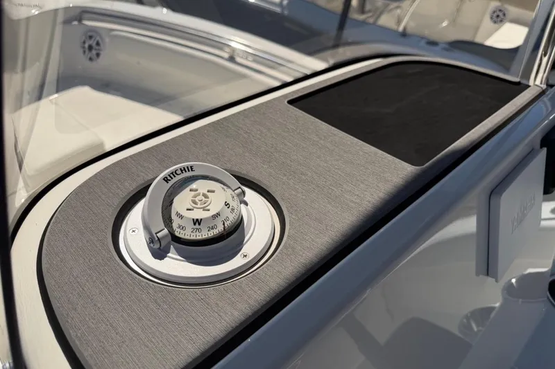 Slide: The Image of Compass on 2026 Key West 203 FS boat dashboard, featuring sleek design and navigation tools. - 35