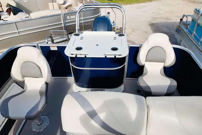 Slide: The Image of 2019 Sylvan Mirage Fish 8520 Party Fish boat interior with seating and fishing station. - 9