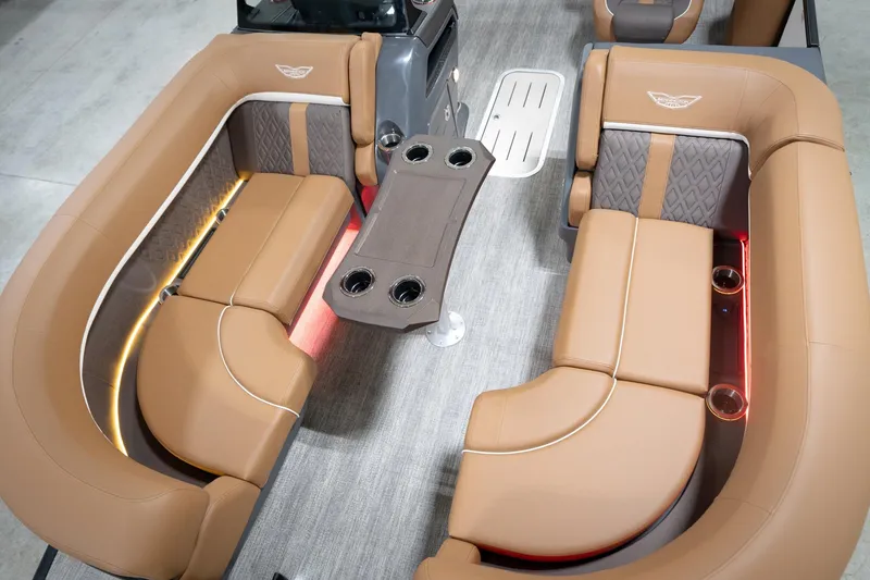 Slide: The Image of Luxurious interior of 2026 Bennington 22 MSB pontoon boat with plush seating and ambient lighting. - 12